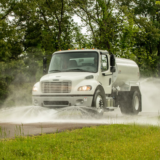 Road Flusher in Action on Site